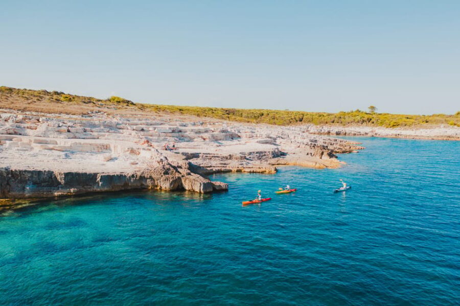 Cape Kamenjak: Kayak Tour with Cave Experience - Cliff jumping into crystal clear water (optional, but memorable)