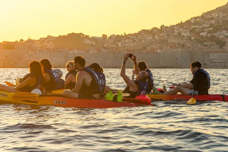Dubrovnik: Guided Sunset Sea Kayaking Tour with Wine - Betina Cave Beach: Swimming and Snorkeling Time