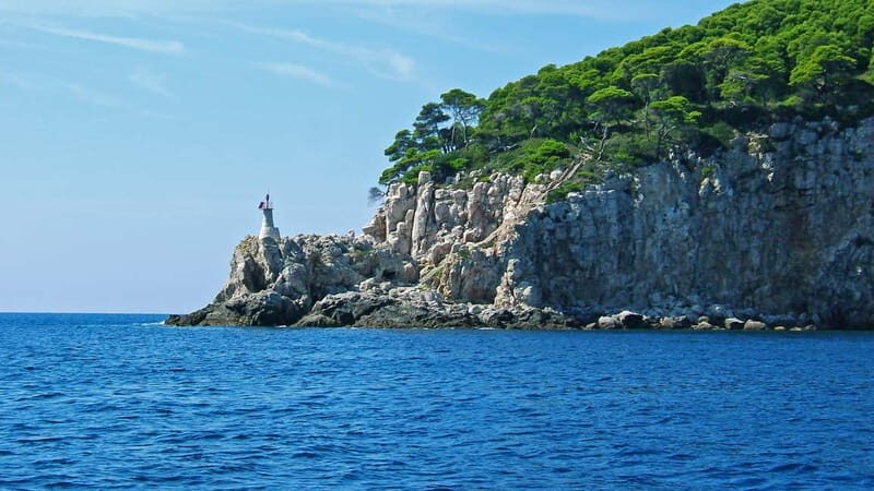 Dubrovnik: Island Boat Tour with Drinks & Lunch - Drinks, music, and the crew energy on TRITON