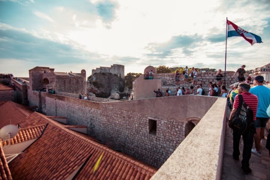 Dubrovnik: Walls and Wars Walking Tour - Meeting Point at Brsalje 8 (Orange Umbrella) and a Clean Start