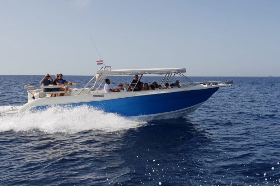 From Hvar: Blue and Green Cave Day Tour - Entering the Blue Cave via shuttle: that silver-blue moment