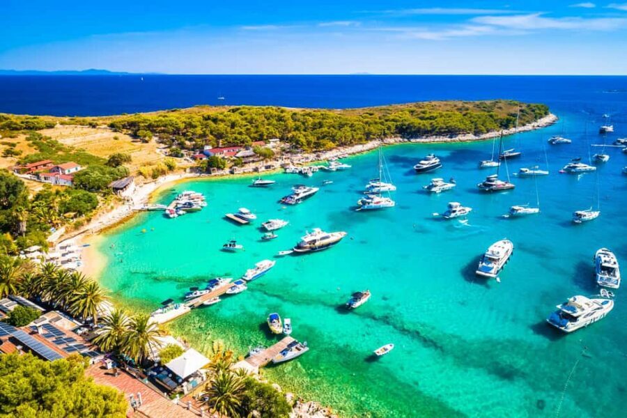 From Hvar: Blue Cave, Green Cave & 5 Islands Speedboat Tour - Budikovac Blue Lagoon: the first splash at sea-level beauty
