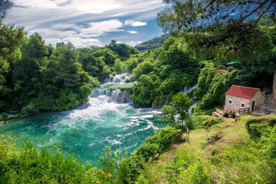 From Split: Krka Waterfalls Tour with Boat Ride & Swimming - Free time at the falls: photos, travertine pools, and swimming-ready vibes