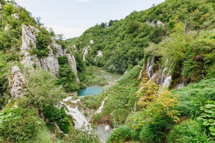 From Split: Plitvice Lakes National Park Guided Tour - First big moment in Plitvice: upper lakes calm vs lower lakes crowds
