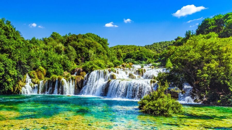 From Split & Trogir: Krka Waterfalls Day Tour with Boat Ride - The riverboat to Skradin: the most relaxing half of the day
