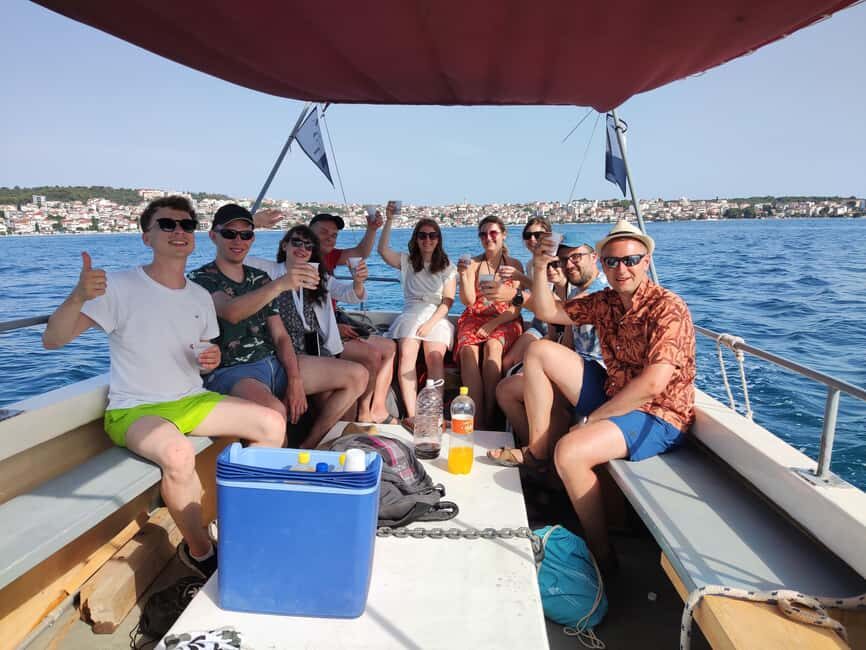 From Trogir: Guided Panoramic Boat Tour with Drinks - Drinks onboard: included wine and what it does for the vibe