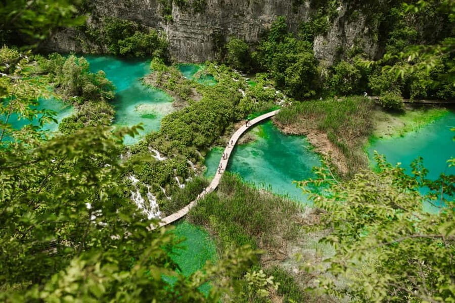 From Zagreb: Plitvice Lakes National Park Tour with Tickets - Boat moments and when the water transport actually helps