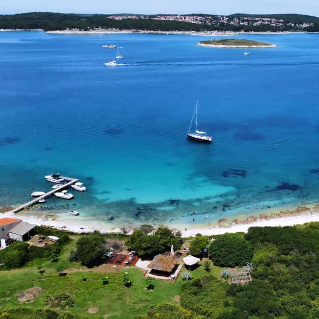 Full-Day Boat Trip, Cave Swim, lunch & Drinks - Medulin/Ceja - Cape Kamenjak Nature Park: cliffs, wildlife, and the cave swim stop