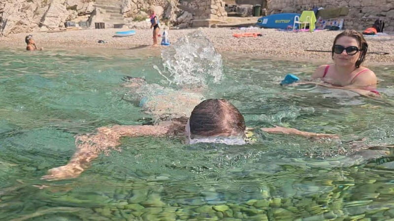 Makarska: 3-Island Speedboat Golden Horn & Blue Lagoon Tour - Boat comfort: shade, water, music, and the small-group feel