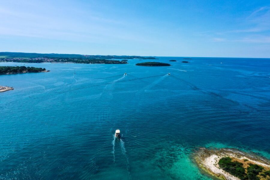 Poreč: Panoramic Morning Cruise Among 20 Islands with Drinks - Drinks and the little ritual onboard
