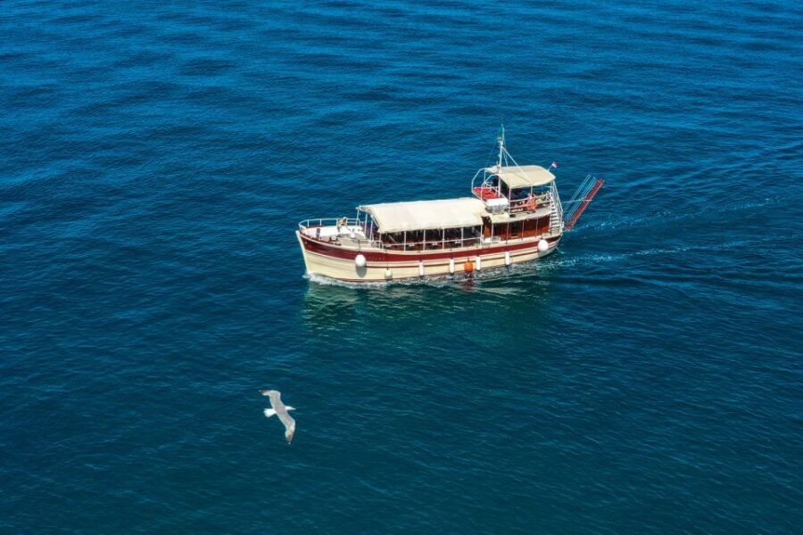 Poreč: Panoramic Morning Cruise Among 20 Islands with Drinks - On-water comfort: bar, toilet, blankets, and managing motion