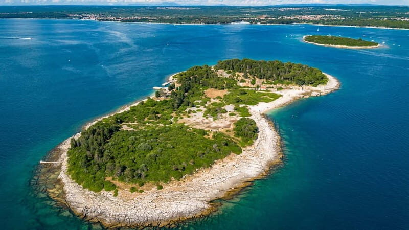 Pula: National Park Brijuni, 2 swimming stops, lunch, drinks - Boarding the wooden boat: what that means for your day