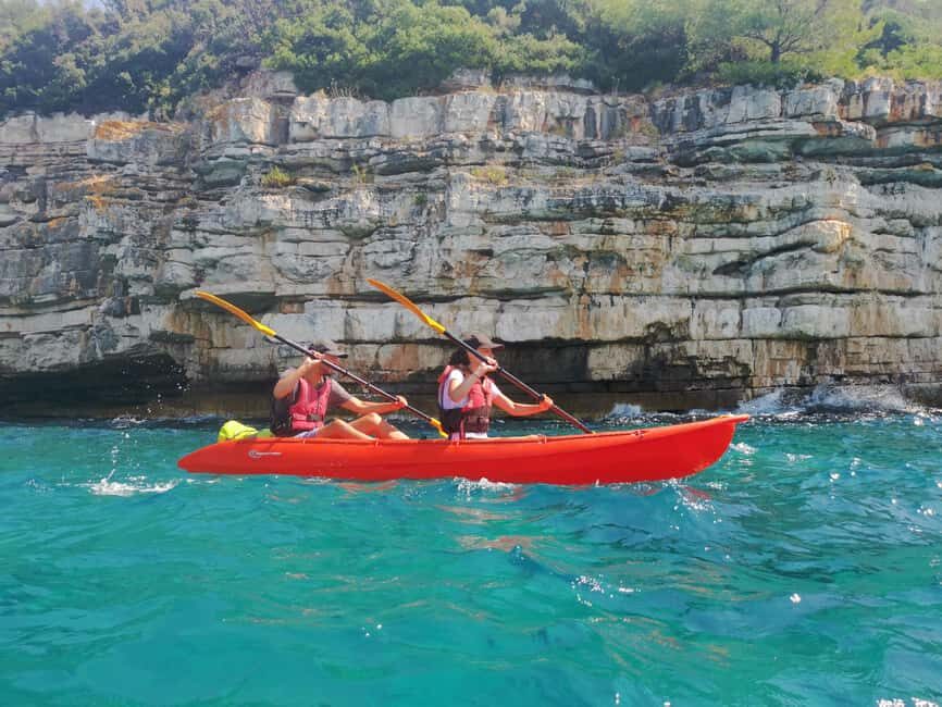 Pula: Sea Adventure – Boat, Kayak, Snorkeling & Cliff Jumps - Kayaking the Pula cliffs and hidden canyons by sea