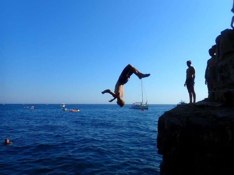 Pula: Sea Adventure – Boat, Kayak, Snorkeling & Cliff Jumps - Hidden beach break: swim, snorkel, relax, and drinks