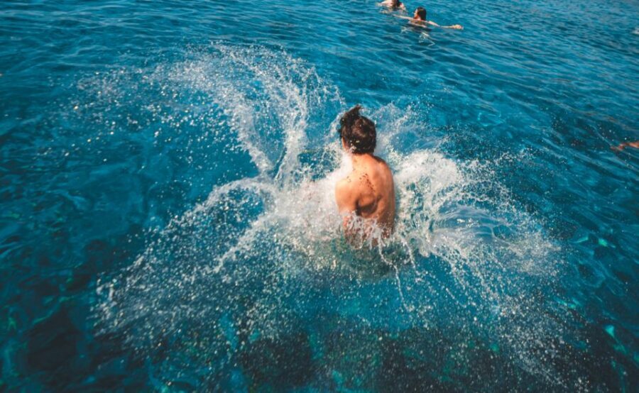 Split: Blue Cave and 5 Islands Tour - Budikovac snorkeling: goggles on a blue-lagoon-like beach