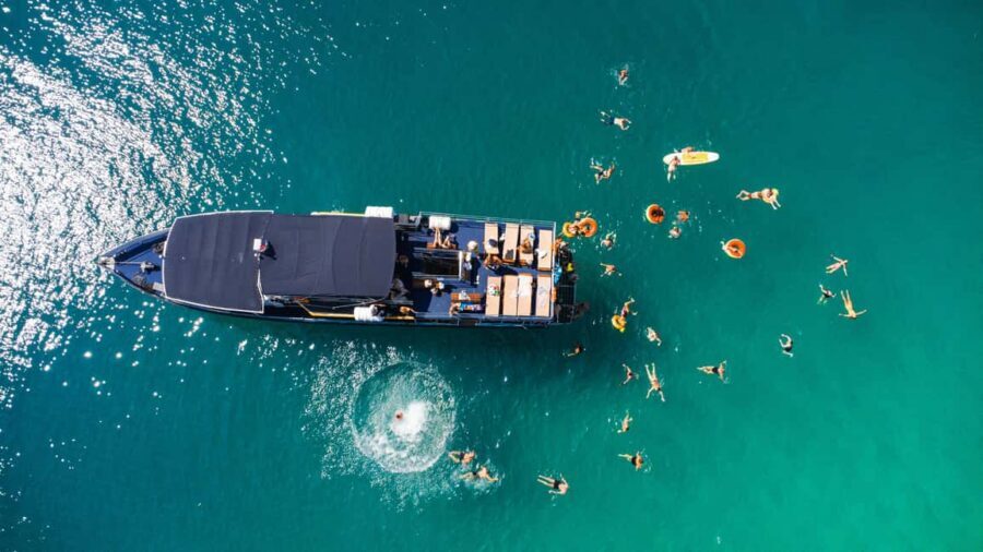 Split: Blue Lagoon 3 Islands All-Inclusive Cruise with Lunch - Krknjaši Blue Lagoon near Drvenik: turquoise water and the best chance for a shipwreck look