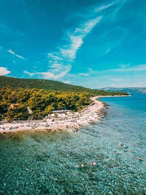 Split: Blue Lagoon, Borkko Beach & Šolta with Food & Drinks - Breakfast starts moving: coffee and croissant on the water