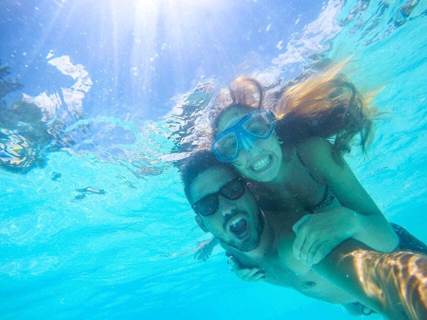 Split: Blue Lagoon, Hvar and 6 Islands Small Group Boat Tour - Crew, safety, and the music vibe on a 12-person boat