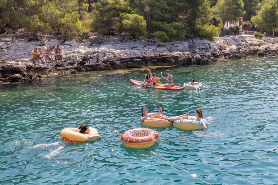 Split: Hvar, Brač, and Pakleni Cruise with Lunch and Drinks - Brac Island bay stop near the coast: swimming plus downtime