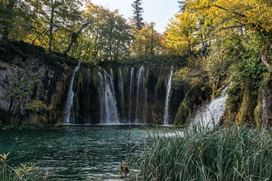 Split: Self-Guided Plitvice Lakes Day Tour with Boat Ride - In the Park: Wooden Paths, Big Water Sound, and Falls Views