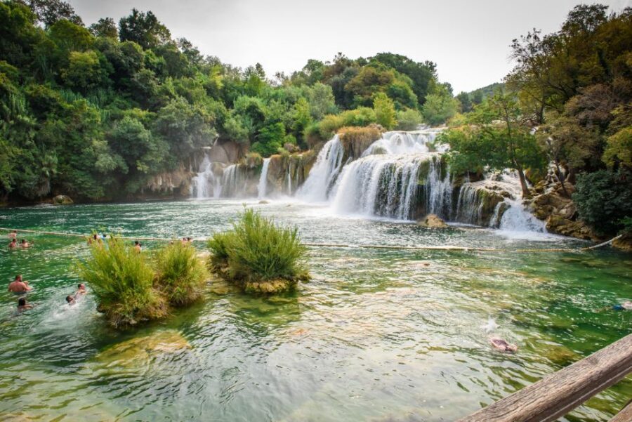 Split/Trogir: Krka National Park Day Trip with Wine Tasting - Skradin Town Time: Wandering, Beach Views, and the Swim Moment