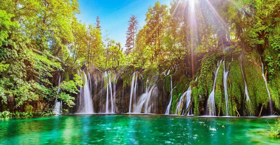 Zadar: Plitvice Lakes with Boat Ride and Zadar Old Town Tour - Morning from Zadar: coach comfort, plus a guide who talks